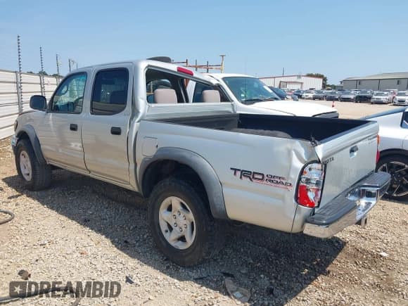 ✅ 2003 Toyota Tacoma PreRunner • VIN: 5TEGN92N63Z264048 • Lot: 43075502. Listed on IAAI with 182,082 mi. Free auction sales archive from the USA and detailed vehicle history report at DreamBid. Image 3.