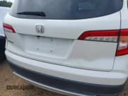 ✅ 2019 Honda Pilot EX-L • VIN: 5FNYF5H51KB008630 • Lot: 42966581. Listed on IAAI with 182,416 mi. Free auction sales archive from the USA and detailed vehicle history report at DreamBid. Image 18.