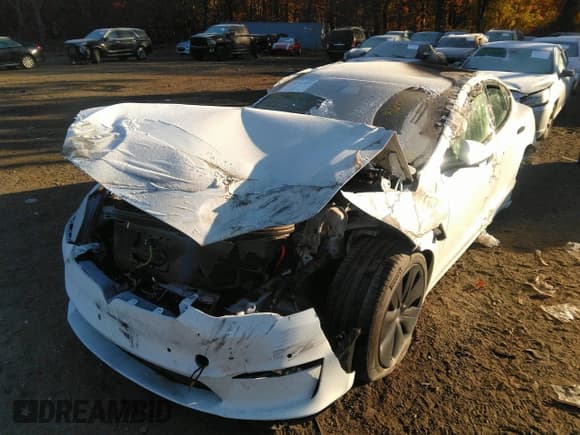 ✅ 2022 Tesla Model S • VIN: 5YJSA1E54NF488023 • Lot: 36074023. Listed on IAAI with 200 mi. Free auction sales archive from the USA and detailed vehicle history report at DreamBid. Image 6.