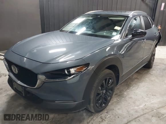 ✅ 2022 Mazda CX-30 S Carbon Edition • VIN: 3MVDMBCL8NM447234 • Lot: 42511600. Listed on IAAI with 51,926 mi. Free auction sales archive from the USA and detailed vehicle history report at DreamBid. Image 2.