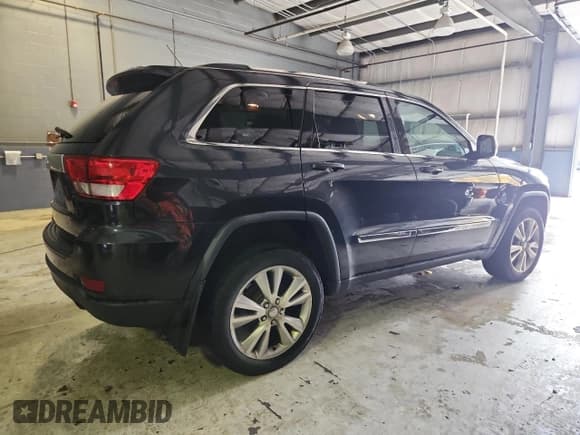 ✅ 2013 Jeep Grand Cherokee Laredo • VIN: 1C4RJFAG4DC556254 • Lot: 86259695. Listed on Copart with 248,765 mi. Free auction sales archive from the USA and detailed vehicle history report at DreamBid. Image 3.