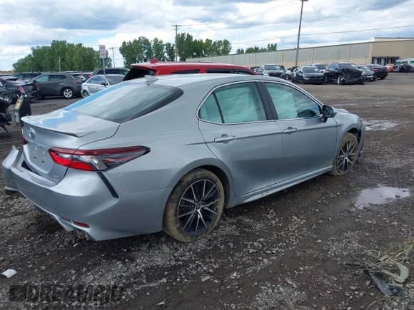 2023 Toyota Camry SE with VIN 4T1T11BK2PU100968, listed as a IAAI auction lot 43106071 with 7,833 mi miles and . Bid and sale history available at DreamBid. Image 4.