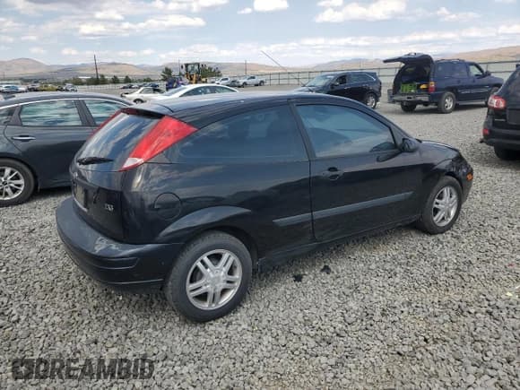 ✅ 2004 Ford Focus ZX3 • VIN: 3FAFP31344R119116 • Lot: 71017385. Listed on Copart with 73,275 mi. Free auction sales archive from the USA and detailed vehicle history report at DreamBid. Image 3.