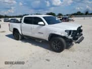 ✅ 2023 Toyota Tacoma SR5 • VIN: 3TYAZ5CN8PT041924 • Lot: 85926705. Listed on Copart with 34,678 mi. Free auction sales archive from the USA and detailed vehicle history report at DreamBid. Image 4.