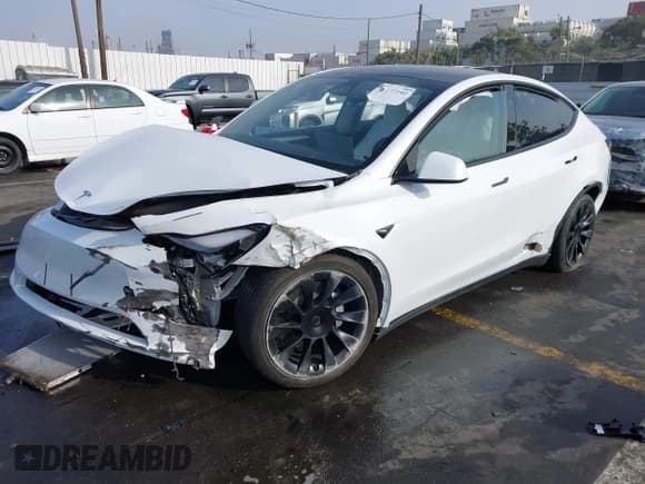 ✅ 2023 Tesla Model Y Long Range • VIN: 7SAYGDEE3PF900030 • Lot: 41147192. Listed on IAAI with 13,903 mi. Free auction sales archive from the USA and detailed vehicle history report at DreamBid. Image 18.