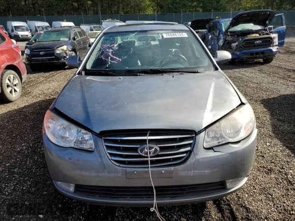 2010 Hyundai Elantra GLS z VIN KMHDU4AD6AU060384, wystawiony jako Copart lot #76948124 z przebiegiem 98 851 mil mil oraz Szkoda całkowita • Salvage title. Historia ofert i sprzedaży dostępna na DreamBid. Obrazek 5.