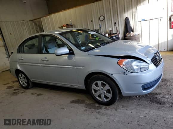 2011 Hyundai Accent GLS z VIN KMHCN4AC9BU572786, wystawiony jako Copart lot #76304184 z przebiegiem 62 845 mil mil oraz Szkoda całkowita • Salvage title. Historia ofert i sprzedaży dostępna na DreamBid. Obrazek 4.