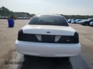 ✅ 2010 Ford Police Interceptor • VIN: 2FABP7BV3AX120969 • Lot: 57293675. Listed on Copart with 295,036 mi. Free auction sales archive from the USA and detailed vehicle history report at DreamBid. Image 6.