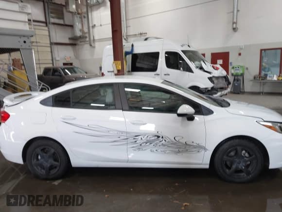 ✅ 2016 Chevrolet Cruze LS • VIN: 1G1BB5SMXG7272517 • Lot: 41283610. Listed on IAAI with 57,497 mi. Free auction sales archive from the USA and detailed vehicle history report at DreamBid. Image 13.