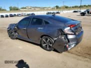 ✅ 2018 Honda Civic Touring • VIN: 19XFC1F95JE001392 • Lot: 87070235. Listed on Copart with 80,915 mi. Free auction sales archive from the USA and detailed vehicle history report at DreamBid. Image 2.