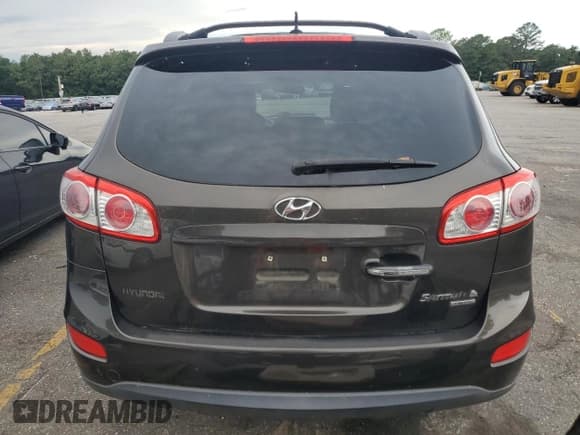 ✅ 2011 Hyundai Santa Fe Limited • VIN: 5XYZK4AG3BG047041 • Lot: 62326364. Listed on Copart with 102,081 mi. Free auction sales archive from the USA and detailed vehicle history report at DreamBid. Image 6.