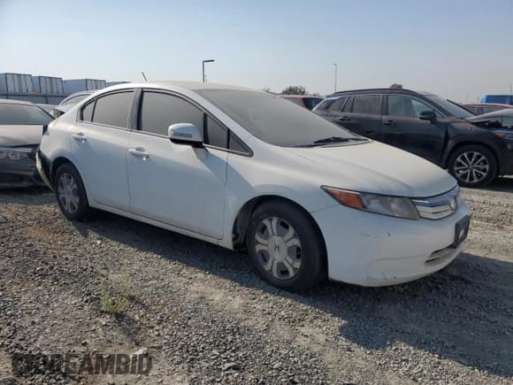 ✅ 2012 Honda Civic • VIN: JHMFB4F20CS000060 • Lot: 54864175. Listed on Copart with 186,176 mi. Free auction sales archive from the USA and detailed vehicle history report at DreamBid. Image 4.