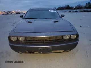 ✅ 2014 Dodge Challenger R/T Plus • VIN: 2C3CDYBT5EH160826 • Lot: 82748844. Wystawiony na Copart z przebiegiem 160 152 mil. Bezpłatny archiwum sprzedaży aukcyjnych z USA i szczegółowy raport historii pojazdu na DreamBid. Zdjęcie 5.