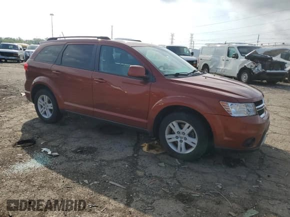 ✅ 2012 Dodge Journey SXT • VIN: 3C4PDCBB5CT323308 • Лот: 66575795. Опубликован ранее на Copart с пробегом 103 082 миль. Бесплатный доступ к архиву аукционных продаж из США и подробный отчёт об истории автомобиля на DreamBid. Изображение 4.