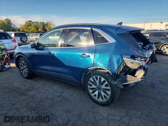 ✅ 2020 Ford Escape Titanium • VIN: 1FMCU9J98LUA20511 • Lot: 86096125. Listed on Copart with 54,496 mi. Free auction sales archive from the USA and detailed vehicle history report at DreamBid. Image 2.