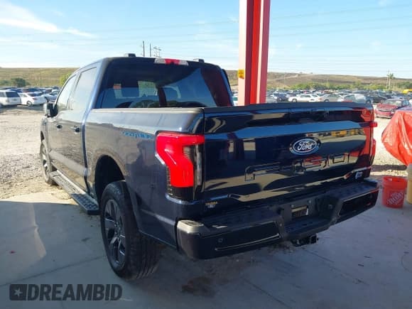 ✅ 2024 Ford F-150 Lightning Flash • VIN: 1FTVW3L72RWG23113 • Lot: 41447854. Listed on IAAI with 1,917 mi. Free auction sales archive from the USA and detailed vehicle history report at DreamBid. Image 3.
