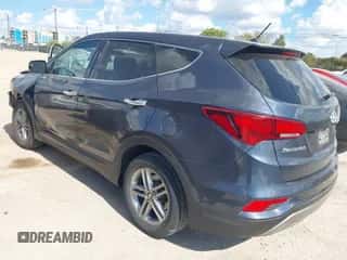 2018 Hyundai Santa Fe 2.4L with VIN 5NMZT3LB3JH073815, listed as a IAAI auction lot 43292068 with 132,770 mi miles and . Bid and sale history available at DreamBid. Image 3.