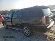 ✅ 2015 GMC Yukon XL Denali • VIN: 1GKS1JKJXFR278785 • Лот: 81475245. Опубликован ранее на Copart с пробегом 230 763 миль. Бесплатный доступ к архиву аукционных продаж из США и подробный отчёт об истории автомобиля на DreamBid. Изображение 2.