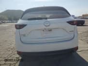 ✅ 2021 Mazda CX-5 Touring • VIN: JM3KFBCM1M1491946 • Лот: 51637245. Опубликован ранее на Copart с пробегом 57 332 миль. Бесплатный доступ к архиву аукционных продаж из США и подробный отчёт об истории автомобиля на DreamBid. Изображение 6.