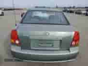 2004 Hyundai Accent GL с VIN KMHCG45C14U540938, выставлен на аукционе Copart как лот 46701935 с пробегом 71 891 миль миль и Списание • Salvage title. История ставок и продаж доступна на DreamBid. Изображение 6.