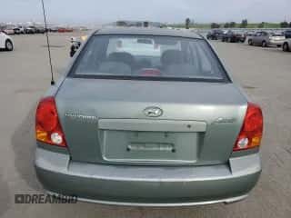 2004 Hyundai Accent GL z VIN KMHCG45C14U540938, wystawiony jako Copart lot #46701935 z przebiegiem 71 891 mil mil oraz Szkoda całkowita • Salvage title. Historia ofert i sprzedaży dostępna na DreamBid. Obrazek 6.