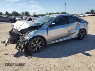 ✅ 2019 Honda Civic Sport • VIN: 2HGFC2F81KH599663 • Лот: 84989605. Опубликован ранее на Copart с пробегом 271 359 миль. Бесплатный доступ к архиву аукционных продаж из США и подробный отчёт об истории автомобиля на DreamBid. Изображение 1.