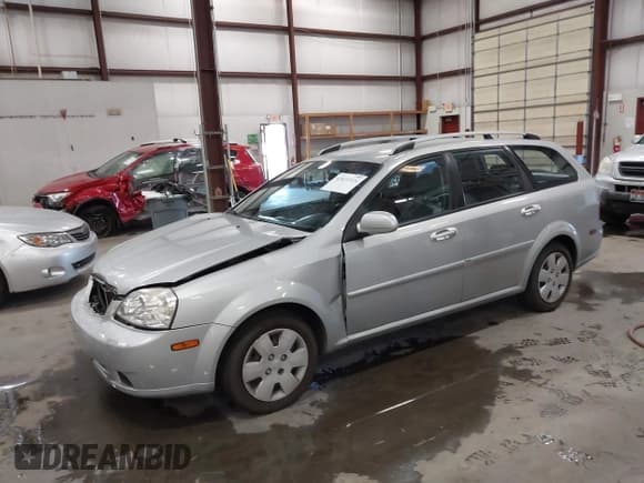 ✅ 2006 Suzuki Forenza • VIN: KL5JD86Z96K347066 • Lot: 43031924. Listed on IAAI with 65,393 mi. Free auction sales archive from the USA and detailed vehicle history report at DreamBid. Image 2.