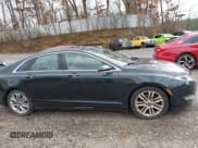 ✅ 2014 Lincoln MKZ • VIN: 3LN6L2J92ER805995 • Lot: 43605738. Listed on IAAI with 126,412 mi. Free auction sales archive from the USA and detailed vehicle history report at DreamBid. Image 13.