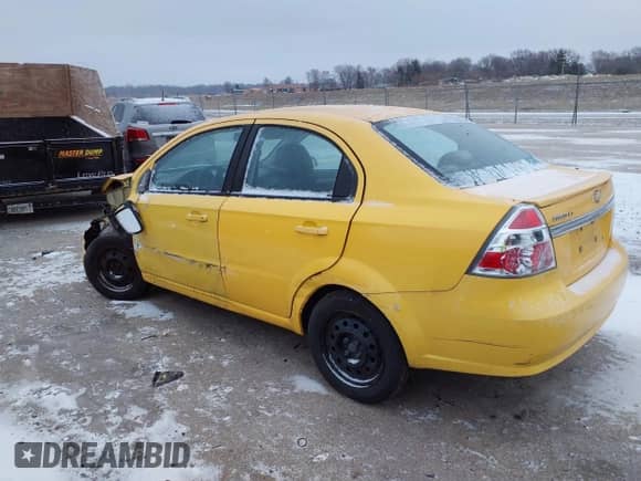 2011 Chevrolet Aveo 1LT z VIN KL1TD5DE2BB124564, wystawiony jako IAAI lot #41388512 z przebiegiem 109 833 mil mil oraz . Historia ofert i sprzedaży dostępna na DreamBid. Obrazek 3.