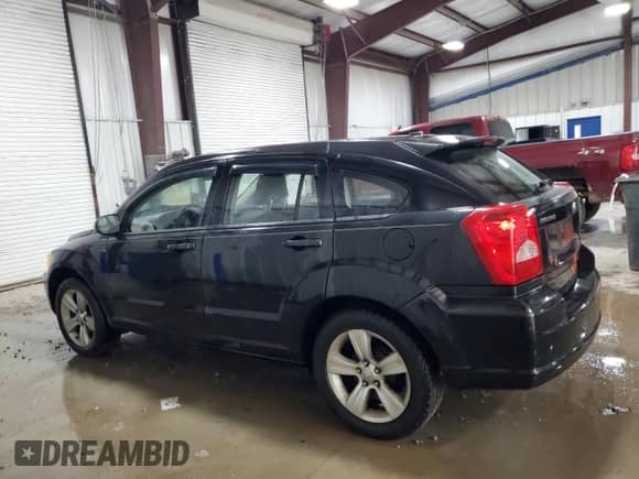 2010 Dodge Caliber SXT with VIN 1B3CB4HA0AD602517, listed as a Copart auction lot 85323475 with 40,840 mi miles and Salvage title. Bid and sale history available at DreamBid. Image 2.