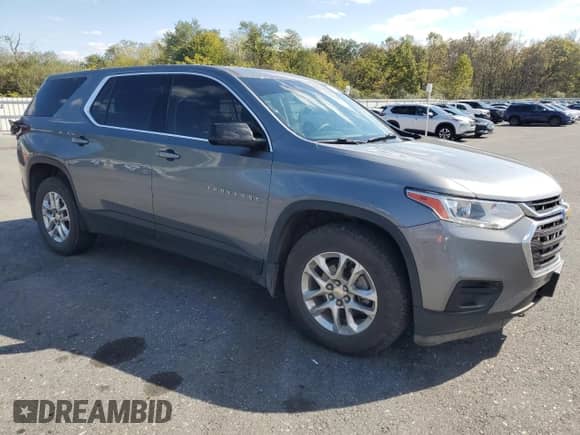 2018 Chevrolet Traverse LS z VIN 1GNEVFKW0JJ196889, wystawiony jako Copart lot #82408665 z przebiegiem 124 944 mil mil oraz Szkoda całkowita • Salvage title. Historia ofert i sprzedaży dostępna na DreamBid. Obrazek 4.