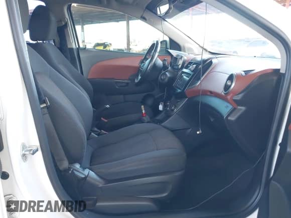 2013 Chevrolet Sonic LT with VIN 1G1JD6SBXD4222966, listed as a IAAI auction lot 42575707 with 140,605 mi miles and . Bid and sale history available at DreamBid. Image 5.