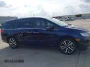 ✅ 2023 Honda Odyssey Touring • VIN: 5FNRL6H88PB052824 • Lot: 43543495. Listed on IAAI with 30,069 mi. Free auction sales archive from the USA and detailed vehicle history report at DreamBid. Image 14.