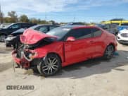 ✅ 2014 Scion tC Monogram • VIN: JTKJF5C75E3068821 • Lot: 90854285. Listed on Copart with 176,590 mi. Free auction sales archive from the USA and detailed vehicle history report at DreamBid. Image 1.