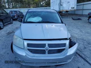 ✅ 2008 Dodge Caliber SE • VIN: 1B3HB28B18D558783 • Лот: 82993104. Опубликован ранее на Copart с пробегом Не указан. Бесплатный доступ к архиву аукционных продаж из США и подробный отчёт об истории автомобиля на DreamBid. Изображение 5.