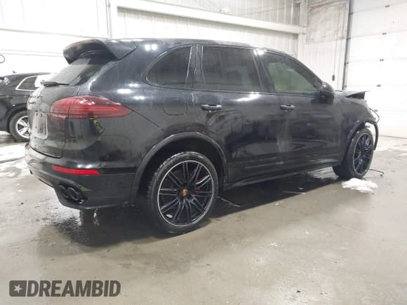 ✅ 2016 Porsche Cayenne GTS • VIN: WP1AD2A24GLA75425 • Lot: 41831754. Listed on IAAI with 92,065 mi. Free auction sales archive from the USA and detailed vehicle history report at DreamBid. Image 4.