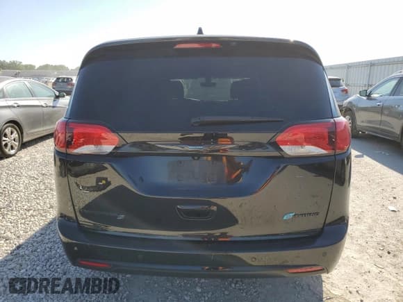 ✅ 2019 Chrysler Pacifica Hybrid Touring Plus • VIN: 2C4RC1H75KR653521 • Лот: 69822014. Опубликован ранее на Copart с пробегом 128 429 миль. Бесплатный доступ к архиву аукционных продаж из США и подробный отчёт об истории автомобиля на DreamBid. Изображение 6.