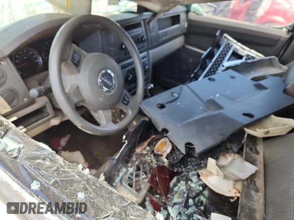 ✅ 2007 Jeep Commander Sport • VIN: 1J8HG48P77C671237 • Lot: 61435535. Listed on Copart with 221,103 mi. Free auction sales archive from the USA and detailed vehicle history report at DreamBid. Image 8.