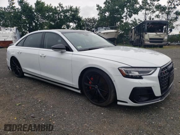 ✅ 2023 Audi S8 • VIN: WAULSAF85PN000614 • Лот: 67359055. Опубликован ранее на Copart с пробегом 20 079 миль. Бесплатный доступ к архиву аукционных продаж из США и подробный отчёт об истории автомобиля на DreamBid. Изображение 4.