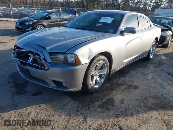✅ 2014 Dodge Charger SXT • VIN: 2C3CDXHG9EH124979 • Lot: 43699205. Listed on IAAI with 159,978 mi. Free auction sales archive from the USA and detailed vehicle history report at DreamBid. Image 2.