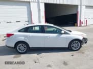 ✅ 2018 Ford Focus SE • VIN: 1FADP3F21JL225220 • Лот: 43670473. Опубликован ранее на IAAI с пробегом 125 394 миль. Бесплатный доступ к архиву аукционных продаж из США и подробный отчёт об истории автомобиля на DreamBid. Изображение 14.