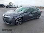 ✅ 2018 Honda Civic EX-T • VIN: JHMFC1F30JX043947 • Lot: 43563584. Listed on IAAI with 145,000 mi. Free auction sales archive from the USA and detailed vehicle history report at DreamBid. Image 2.