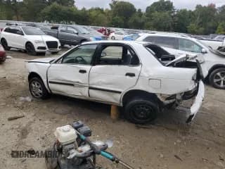 ✅ 2001 Suzuki Esteem GL • VIN: JS2GB41S915200143 • Lot: 69931264. Wystawiony na Copart z przebiegiem 80 853 mil. Bezpłatny archiwum sprzedaży aukcyjnych z USA i szczegółowy raport historii pojazdu na DreamBid. Zdjęcie 2.