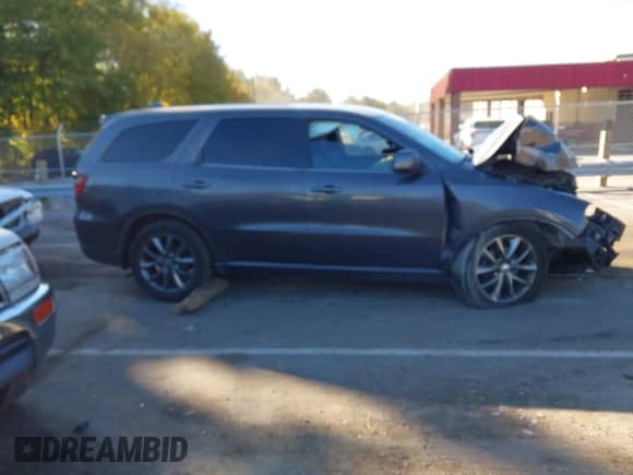 2015 Dodge Durango SXT z VIN 1C4RDJAG7FC120754, wystawiony jako IAAI lot #43473588 z przebiegiem 246 090 mil mil oraz . Historia ofert i sprzedaży dostępna na DreamBid. Obrazek 13.