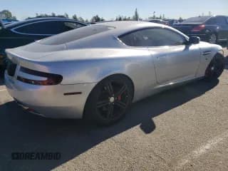 ✅ 2007 Aston Martin DB9 • VIN: SCFAB01A37GA08055 • Lot: 82733743. Wystawiony na Copart z przebiegiem 39 201 mil. Bezpłatny archiwum sprzedaży aukcyjnych z USA i szczegółowy raport historii pojazdu na DreamBid. Zdjęcie 3.