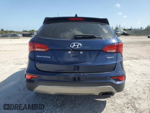 2017 Hyundai Santa Fe 2.4L z VIN 5XYZT3LB4HG455694, wystawiony jako Copart lot #63500455 z przebiegiem Nie podano mil oraz Szkoda całkowita • Salvage title. Historia ofert i sprzedaży dostępna na DreamBid. Obrazek 6.