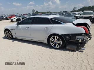 ✅ 2016 Jaguar XJ Portfolio • VIN: SAJWA2G71G8V92740 • Lot: 48558224. Listed on Copart with 84,599 mi. Free auction sales archive from the USA and detailed vehicle history report at DreamBid. Image 2.