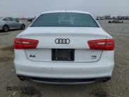 ✅ 2014 Audi A6 Prestige • VIN: WAUHMAFC2EN033040 • Лот: 91291415. Опубликован ранее на Copart с пробегом 189 986 миль. Бесплатный доступ к архиву аукционных продаж из США и подробный отчёт об истории автомобиля на DreamBid. Изображение 6.