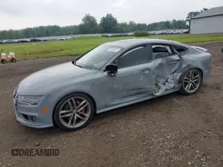 ✅ 2018 Audi A7 Prestige • VIN: WAU23AFC3JN040940 • Lot: 64876875. Listed on Copart with 114,457 mi. Free auction sales archive from the USA and detailed vehicle history report at DreamBid. Image 1.