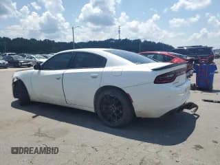 ✅ 2015 Dodge Charger SE • VIN: 2C3CDXBG9FH768265 • Lot: 65721825. Wystawiony na Copart z przebiegiem 218 266 mil. Bezpłatny archiwum sprzedaży aukcyjnych z USA i szczegółowy raport historii pojazdu na DreamBid. Zdjęcie 2.